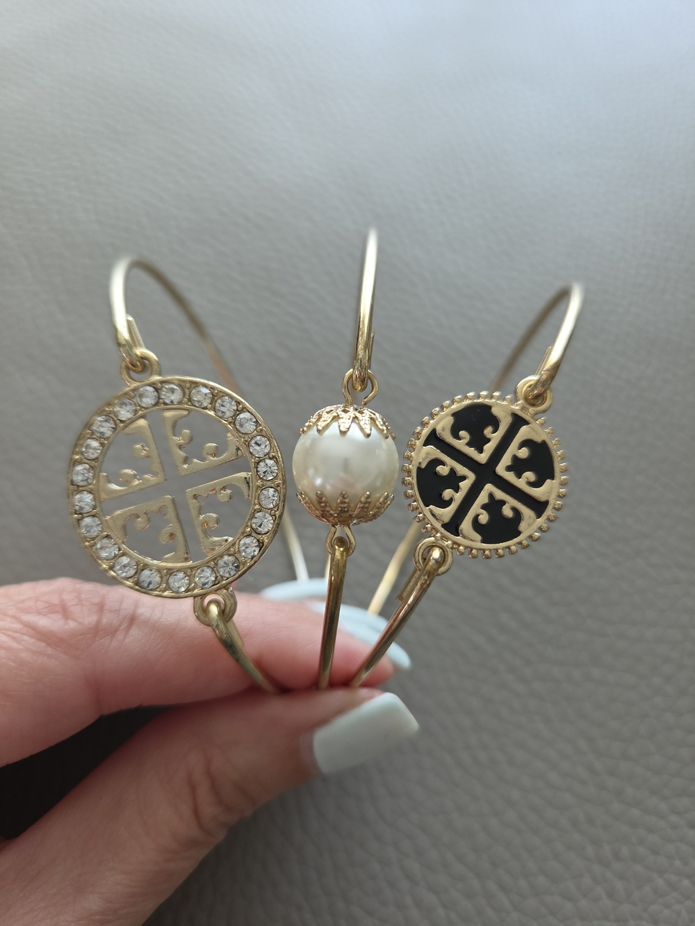 Gold-Tone Pearl and Emblem Bracelets
